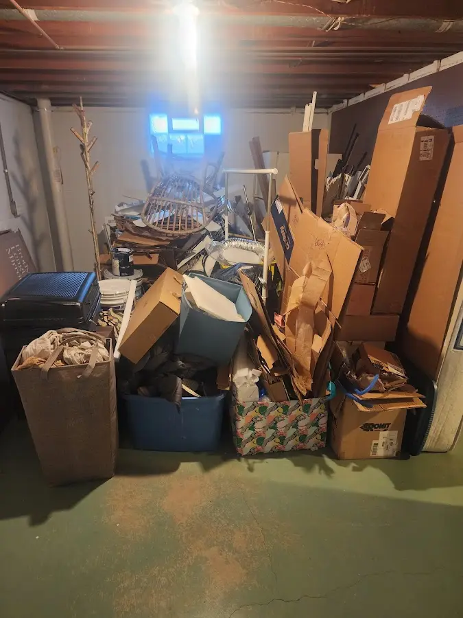 Roll-off dumpster container at job site for Yard Waste Dumpster Rental in Stuttgart